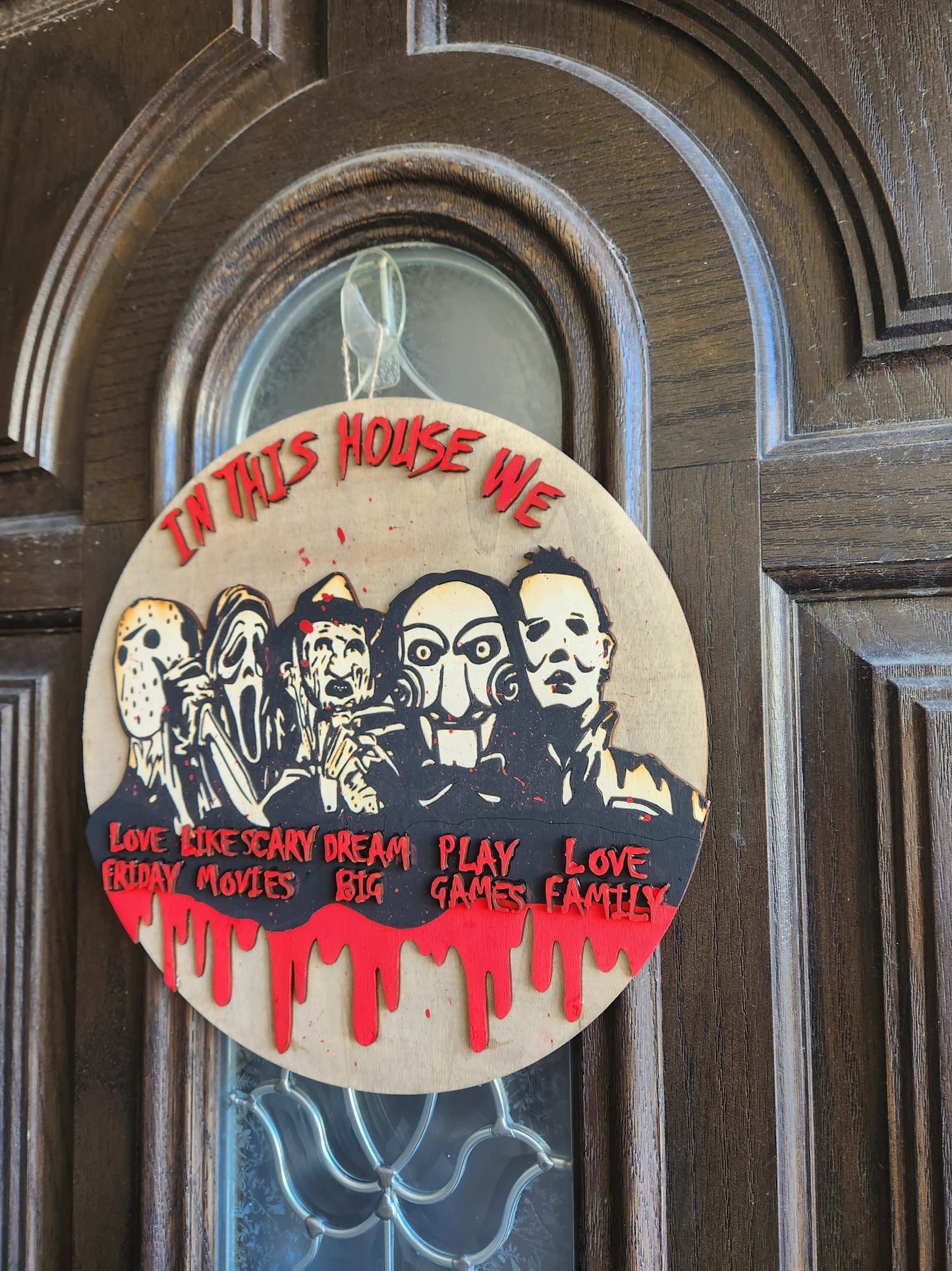 In This House Horror Villains Door Hanger