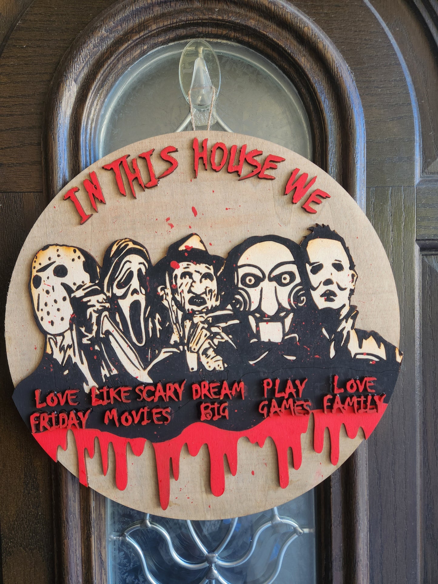 In This House Horror Villains Door Hanger